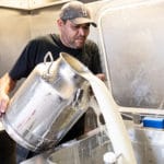 Collecting fresh milk which will eventually make Spooney's ice cream